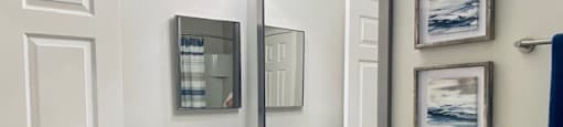 a bathroom with a sink and a mirror at Mainstreet Apartments, Clearwater, FL, 33756
